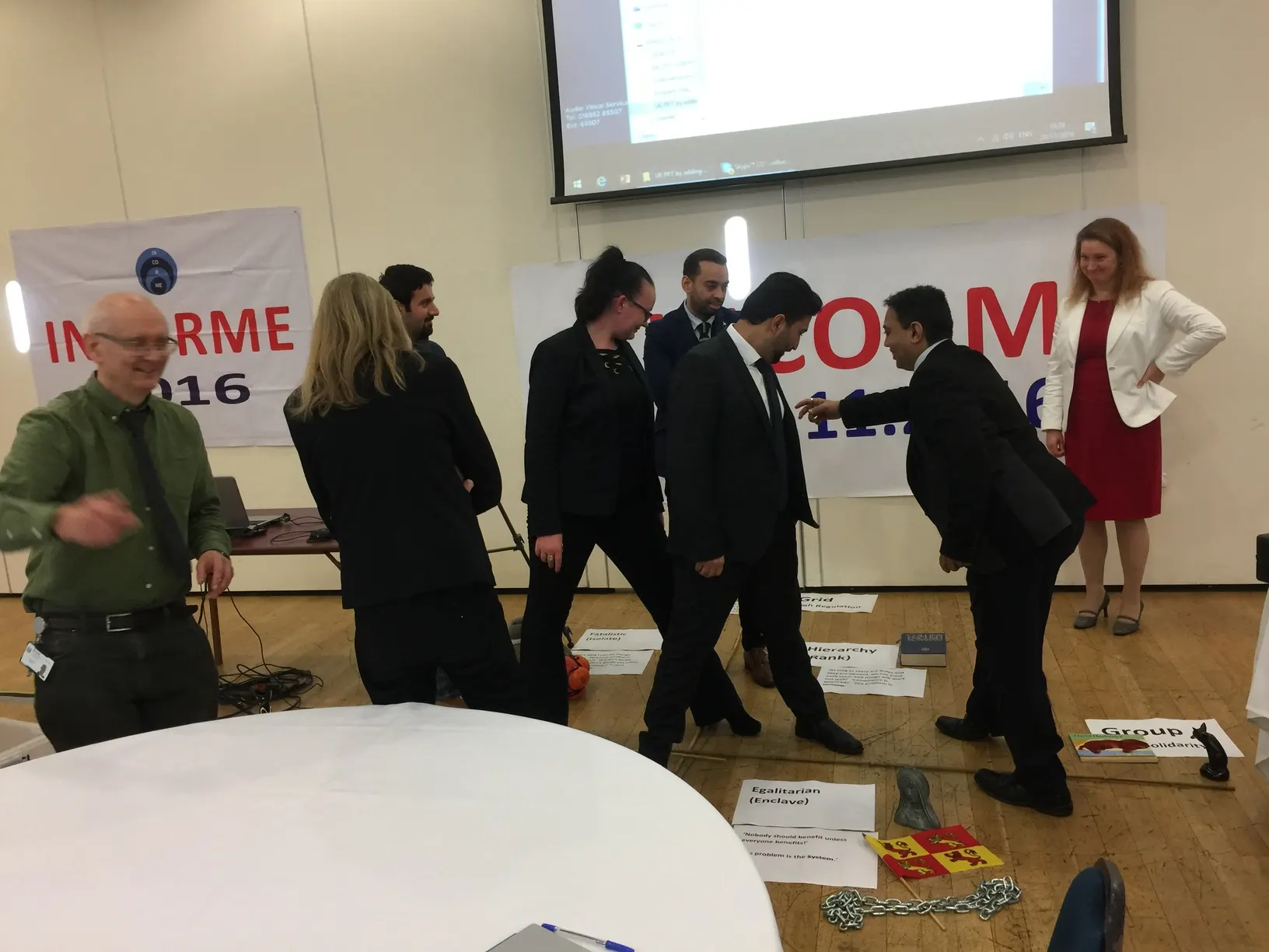 Delegates at an INCORME display