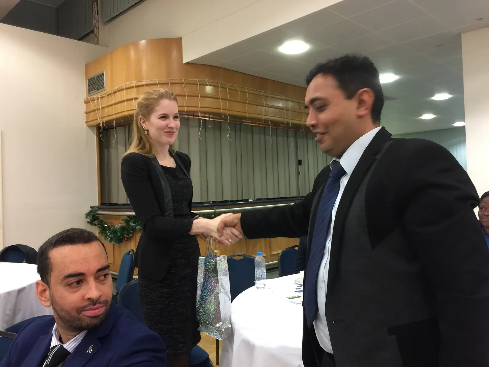Ms Jacklynn Stott receiving a Prize for the best delivery of presentation