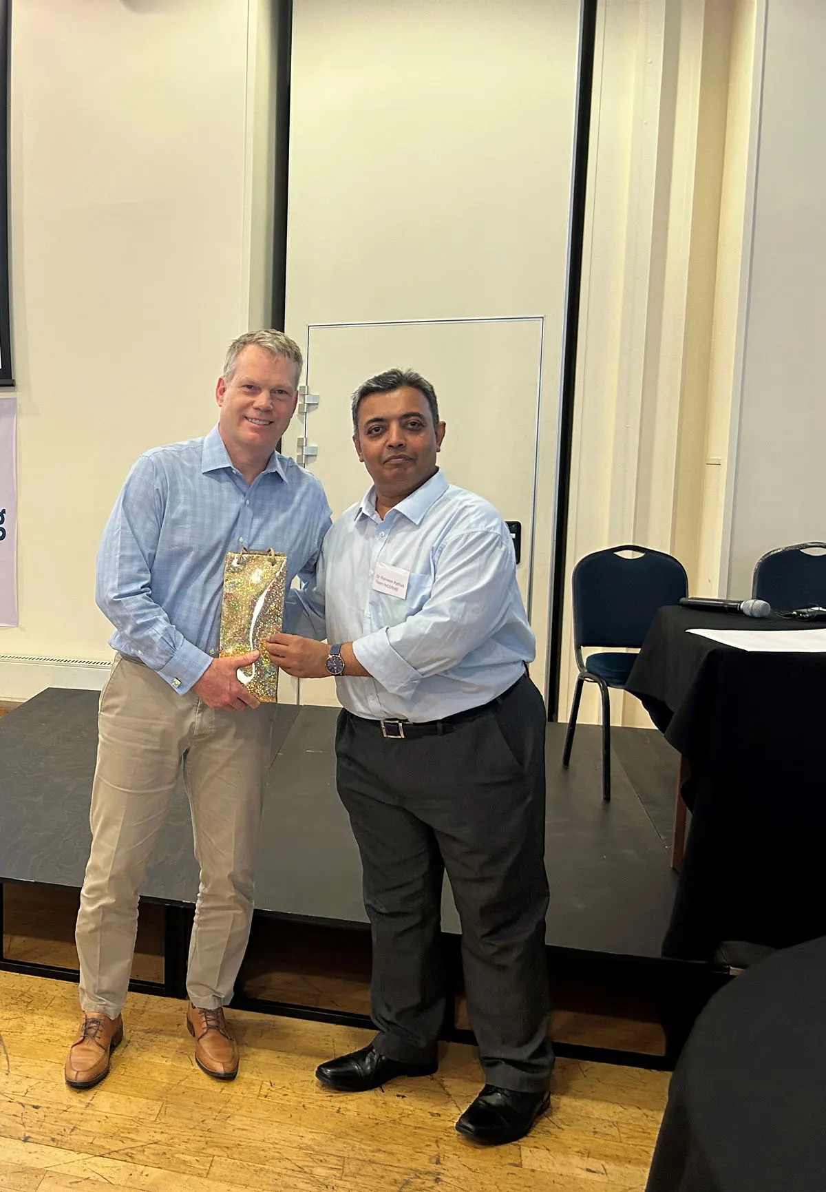Mr David Mahr receiving prize for the Best Presentation from INCORME Founder Dr Vishvesh