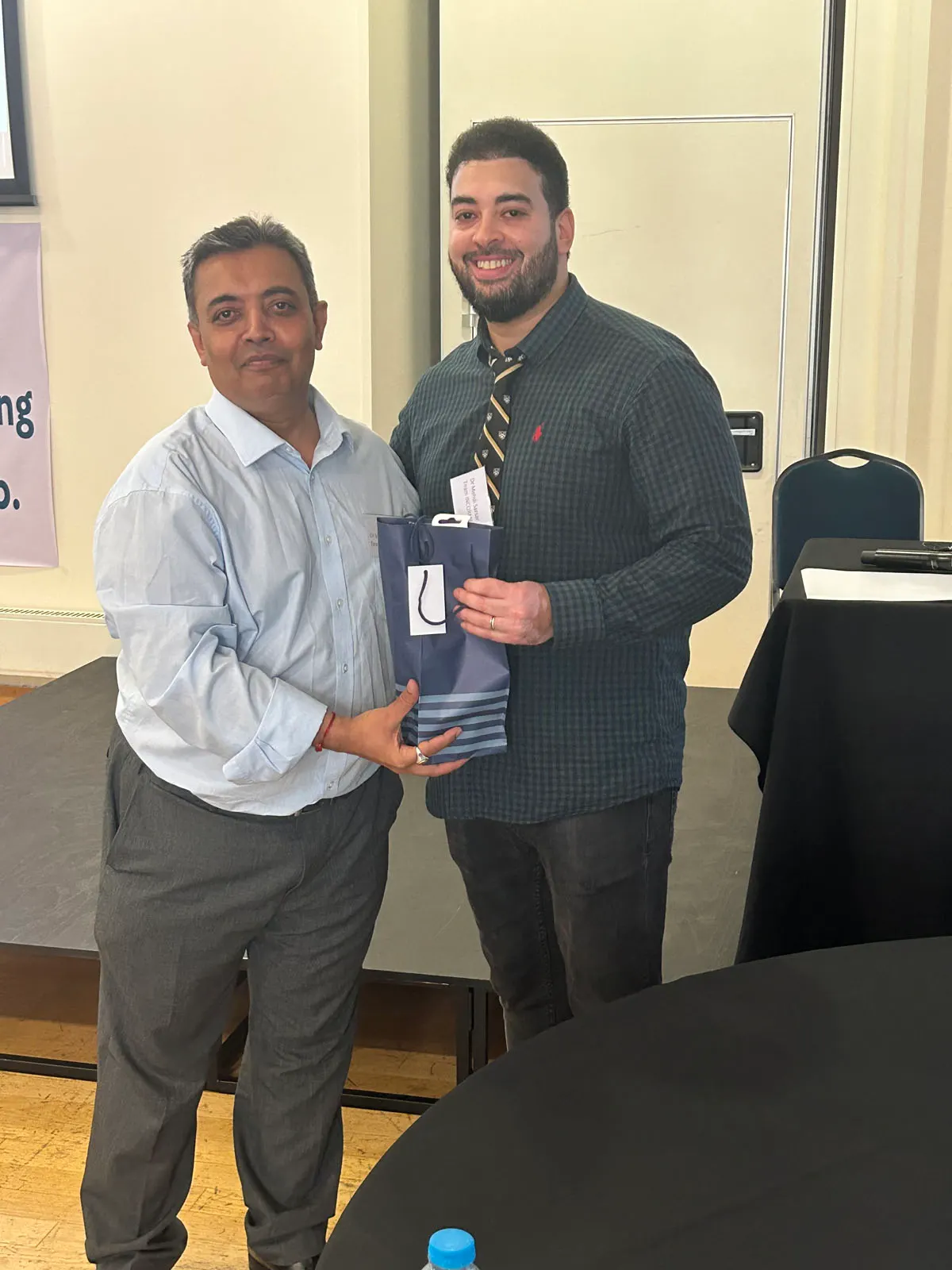 Dr Mehdi Sarsar receving prize for Support to INCORME IV